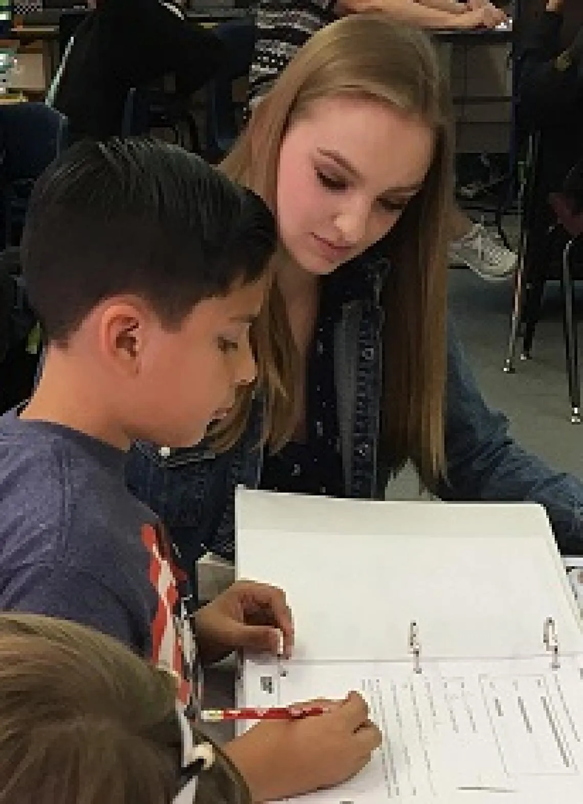 Stemm tutor helping a student